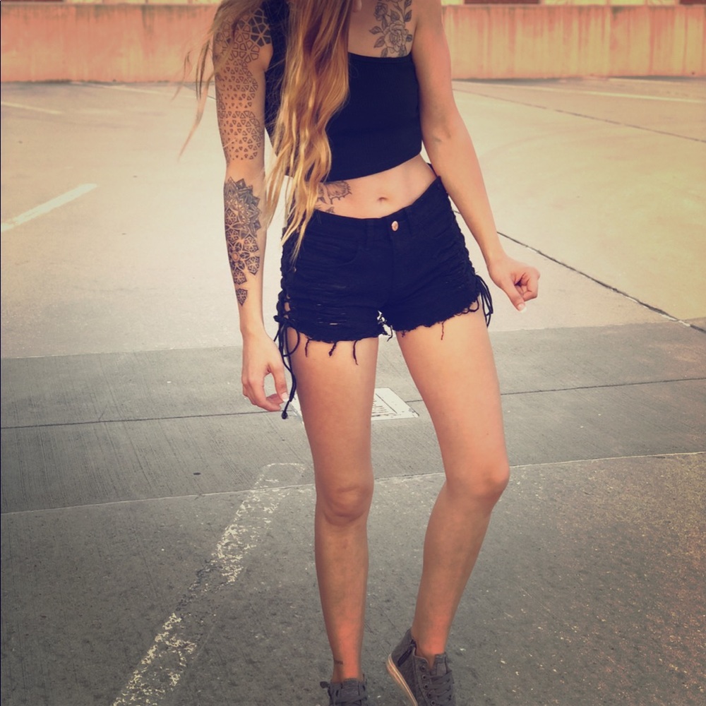 Side tied black distressed shorts